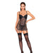 Woman wearing black fishnet and faux leather garter slip with lace-up front, underwire cups, and matching thigh-high stockings.
