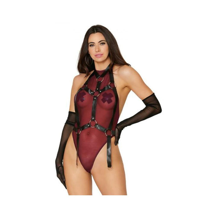 Model wearing a burgundy high-neck mesh teddy with black faux-leather harness and sheer black gloves.