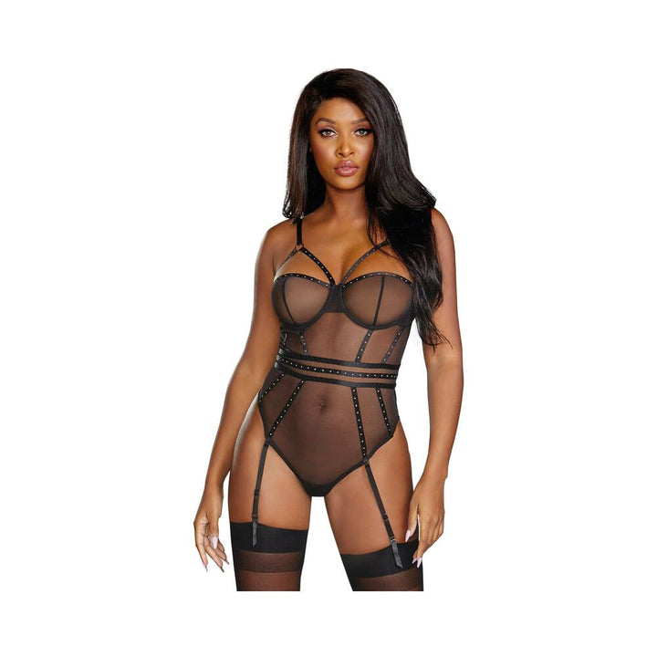 Model wearing black sheer stretch mesh teddy with underwire cups, studded straps, snap crotch, and removable garters with thigh-high stockings.