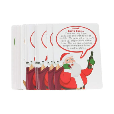 Stack of Drunk Santa Says card game cards featuring Santa holding a bottle and a game instruction text bubble.