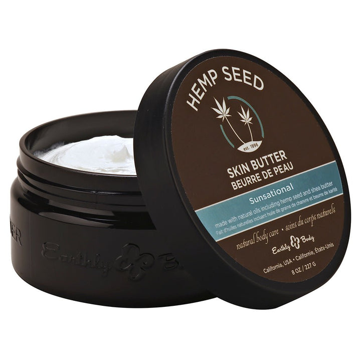 Open jar of EB Hemp Seed Sunsational Skin Butter with visible creamy white moisturizer inside and brown lid.