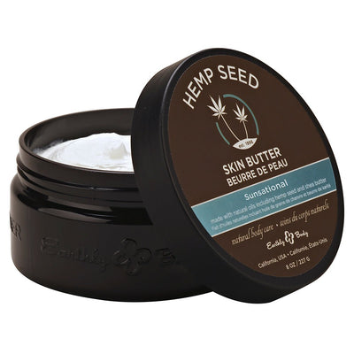 Open jar of EB Hemp Seed Sunsational Skin Butter with visible creamy white moisturizer inside and brown lid.