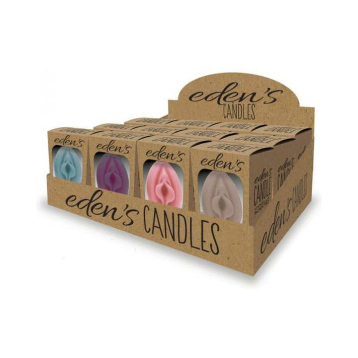 Display box of Eden's Candles featuring 12 vanilla-scented vagina-shaped candles in blue, eggplant, rose, and taupe colors.