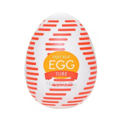 Tenga Egg Tube disposable male stroker in white with red stripes and orange label, compact and portable design.