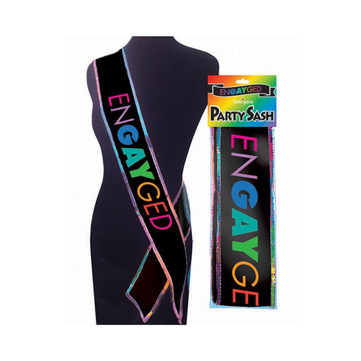 Black party sash with colorful "enGAYged" text and rainbow trim, displayed on a mannequin and in packaging.