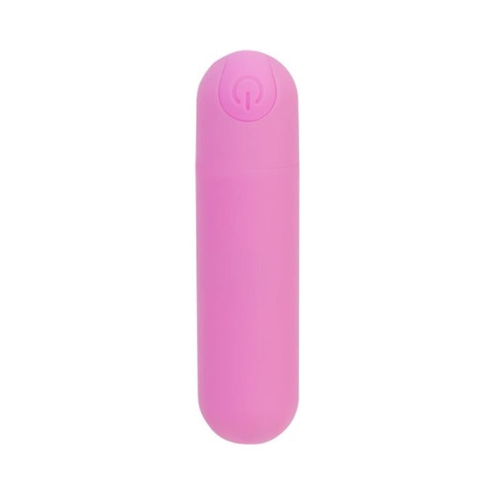 Compact pink rechargeable vibrating bullet with power button on top, designed for discreet pleasure.