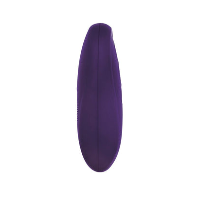 Side view of a purple silicone strapless strap-on with a smooth, curved design.