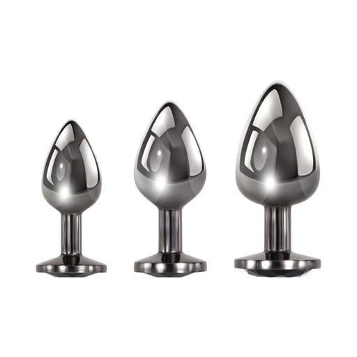 Set of three sleek black metal anal plugs with tapered tips and sparkling black gem bases in small, medium, and large sizes.