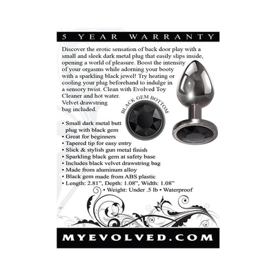 Small sleek gunmetal anal plug with tapered tip and sparkling black gem base, shown with product details and warranty information.