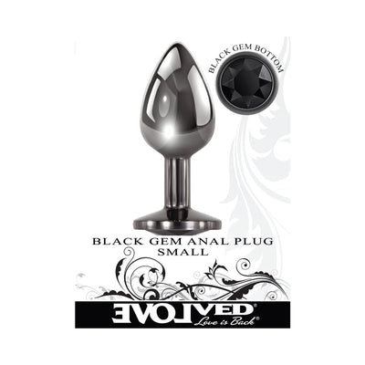 Small sleek gunmetal anal plug with a tapered tip and black gem base by Evolved, shown with decorative branding.