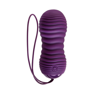 Purple textured vibrating and thrusting egg with a flexible retrieval cord and power button on a white background.
