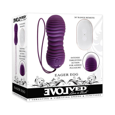 Purple textured vibrating and thrusting egg with remote control displayed on white product packaging.