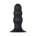 Black silicone anal plug with graduated bulbous shaft and wide suction cup base, standing upright on white background.