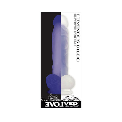 Purple luminous dildo with glow-in-the-dark feature shown in light and dark settings on packaging.