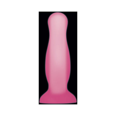 Small pink glow-in-the-dark flexible plug with a flared base and suction cup for hands-free use.