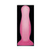 Small pink glow-in-the-dark flexible plug with a flared base and suction cup for hands-free use.