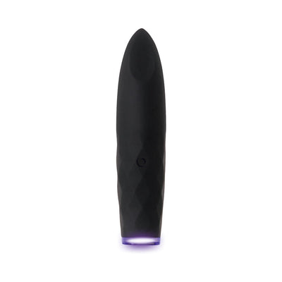 Black rechargeable silicone bullet vibrator with textured surface and glowing purple light at base.
