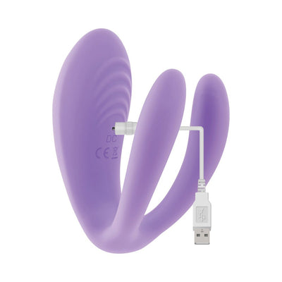 Purple triple shaft mini vibrator with USB charging cable on white background.