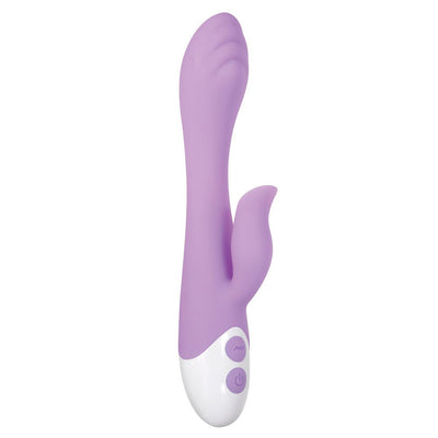 Pink silicone dual-stimulation vibrator with textured head and control buttons on white base.