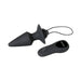 Black silicone tapered anal plug with wireless remote control and retrieval cord on white background.