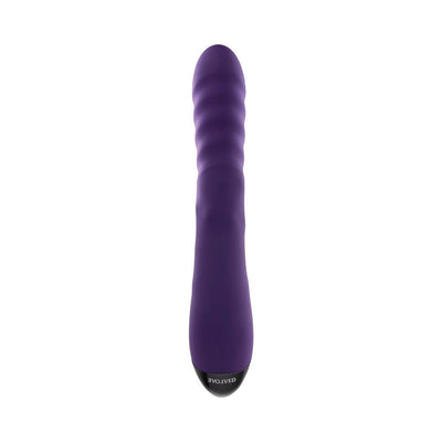 Purple textured silicone vibrator with a smooth tapered tip and black base, designed for dual stimulation.