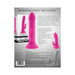 Pink silicone vibrating rabbit with suction cup base and dual motors, shown with packaging and USB charging cable.