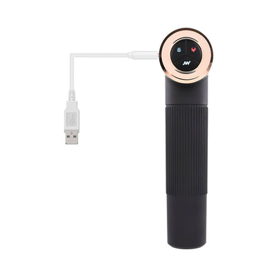 Black handheld thrusting machine with rose gold control panel and USB charging cable attached.