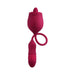 Red dual-action silicone pleasure toy with rose-shaped stimulator and textured vibrating bullet connected by flexible loop.