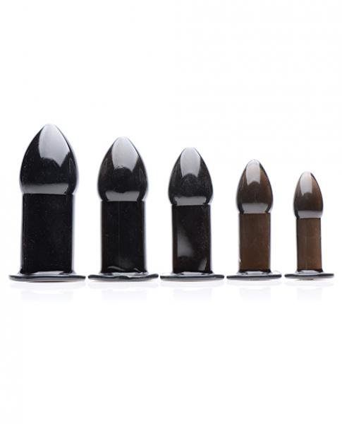 Set of five black tapered anal dilators in graduated sizes with flared bases for safe and comfortable use.