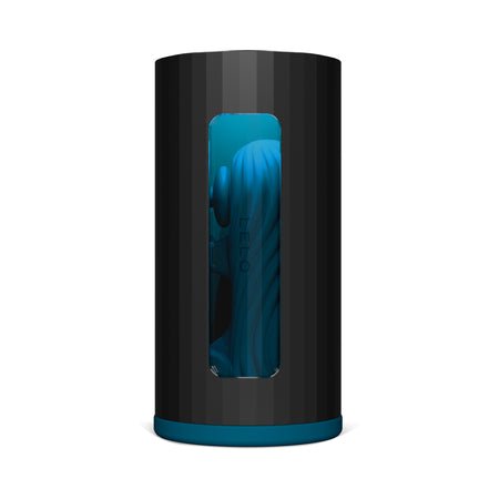 F1S V3 Blue male stroker in black cylindrical case with window showing teal blue textured interior sleeve.