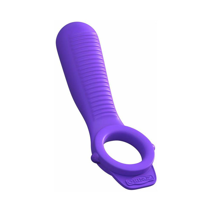 Purple textured silicone couples ring with integrated vibrating stimulator and circular opening.