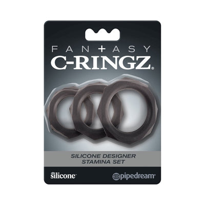Set of three black silicone stamina rings in designer octagonal shape on branded packaging.