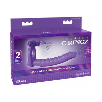 Purple silicone double penetrator rabbit vibrator with dual vibrating bullets shown on product packaging.