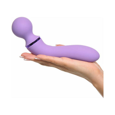Hand holding a lavender ergonomic Duo Wand Massage-Her with a rounded head and curved body design.