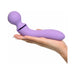 Hand holding a lavender ergonomic Duo Wand Massage-Her with a rounded head and curved body design.