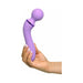 Hand holding a lavender ergonomic Duo Wand Massage-Her with a rounded head and curved handle against a white background.