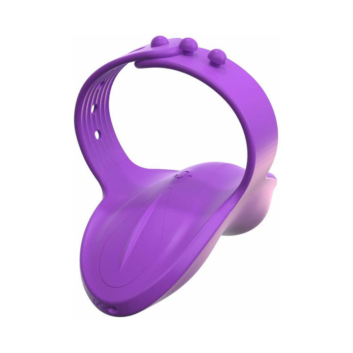 Purple silicone finger vibe with adjustable strap and button controls for versatile massage use.