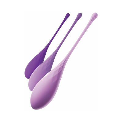 Set of three graduated purple silicone kegel trainers with textured surfaces and slender retrieval cords.