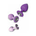 Three purple silicone heart-shaped trainer plugs with sparkling jewel bases in small, medium, and large sizes on white background.