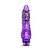 Purple translucent flexible vibrator with realistic shape and internal vibrating bullet, standing upright on white background.