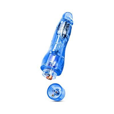 Transparent blue flexible vibrating dildo with removable battery cap showing AA battery inside.