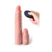 Vibrating 9-inch silicone extension sleeve with 3-inch removable plug and black remote control held in hand.