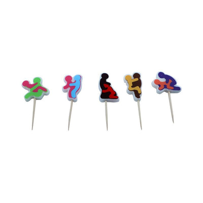 Set of five colorful adult-themed party candles with playful couple silhouettes on toothpicks in various poses.