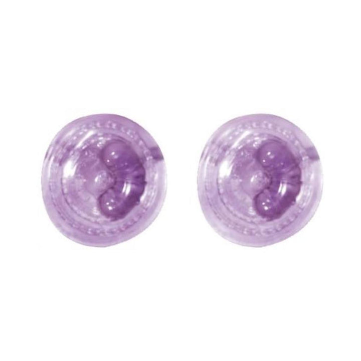 Lavender-colored round breast stimulators with textured jelly ticklers for targeted vibration and hands-free use.