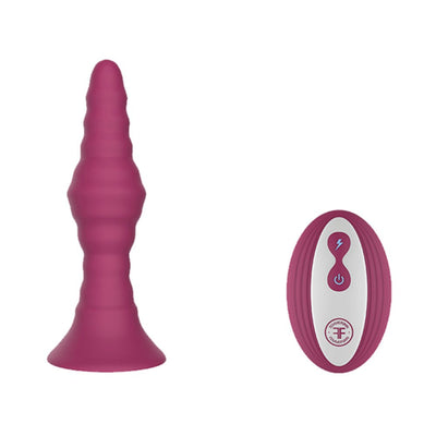 Large fuchsia ribbed vibrating plug with matching remote control on white background.