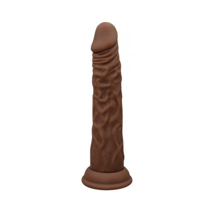 Brown wireless Turbo Shaft vibrator with realistic texture and suction base, designed for versatile and discreet pleasure.