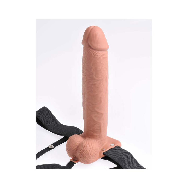 Tan hollow 10-inch rechargeable strap-on with adjustable black elastic harness and remote control.