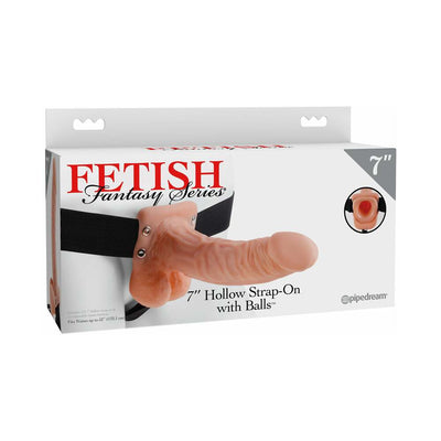 Packaging of Fetish Fantasy Series 7-inch hollow strap-on with balls and adjustable black elastic harness.