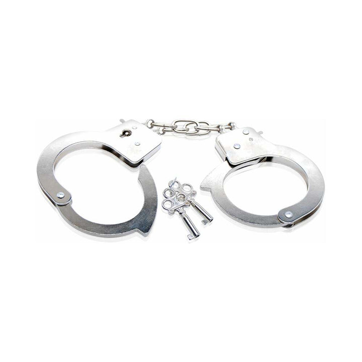 Silver metal beginner cuffs with chain and two small keys on white background