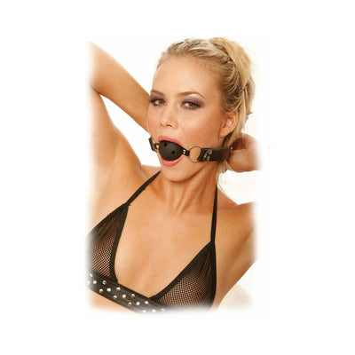 Woman wearing a black breathable ball gag with adjustable leather strap and a black mesh top.
